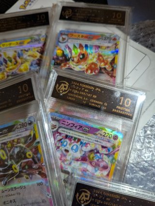 Carte Pokémon 9 pezzi Eevee evoluzioni prismatiche