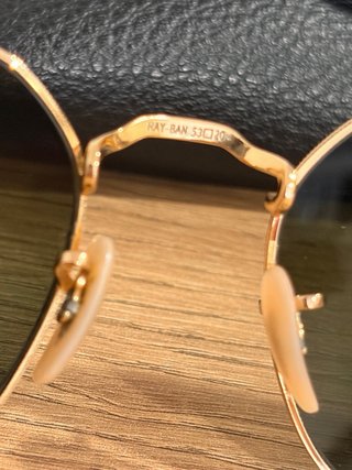 Gafas de sol Ray-Ban doradas y verdes