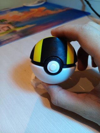 Ultra ball antiestrés de 5,4 cm con botón clicky