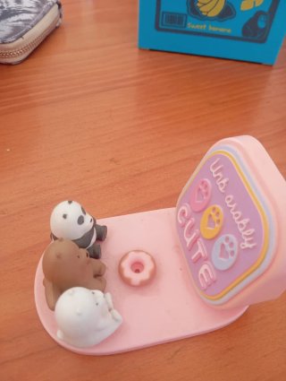 Soporte para teléfono con figuras