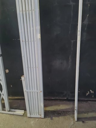 Reja de seguridad extensible tipo ballesta