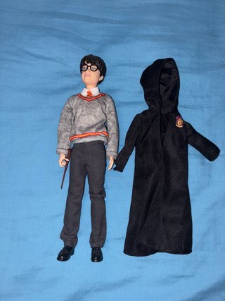 Figura babie Harry Potter con túnica
