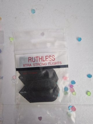 paquetes plumas dardos Ruthless