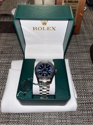 Reloj Rolex Azul y Plateado