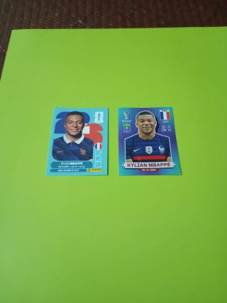 Cromos Kylian Mbappé 2022 y 2026 mundiales.