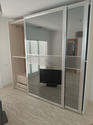 Guardaroba a porte scorrevoli a specchio