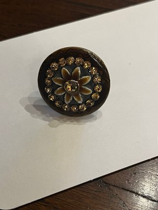 Anello regolabile con fiore e strass