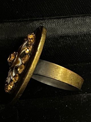 Anello regolabile con fiore e strass