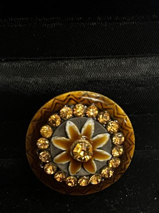 Anello regolabile con fiore e strass