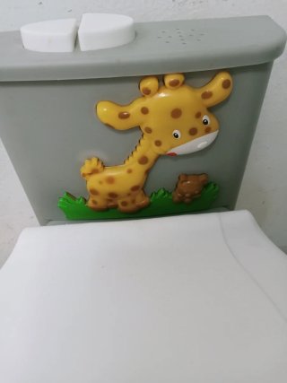 Orinal infantil con diseño de jirafa con mósica
