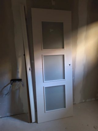 Puerta acristalada paso