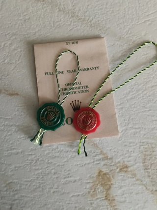 Sigilli Rolex originali verdi e rossi