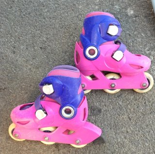 Patines en línea rosas y morados para niña