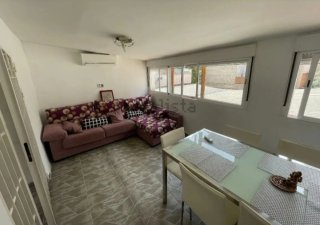 Sofá cheslong y mesa cristal con 6 sillas