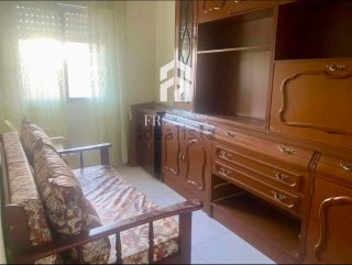 Mueble de salón madera oscura