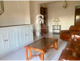 Mueble de salón madera oscura