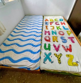 Dormitorio de madera Mukali rosa. Cama nido Armari