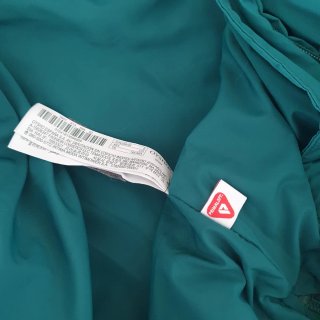 Parka larga Oysho verde talla S