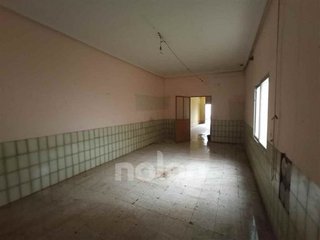 Casa adosada en venta en Tomelloso