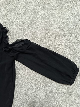 Blusa negra cuello halter Zara