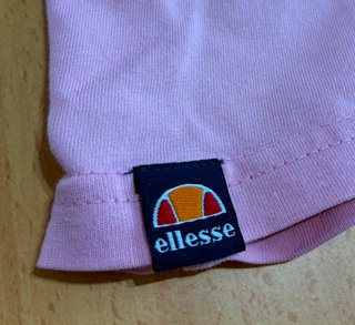 Camiseta Ellesse rosa logo blanco