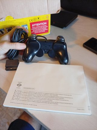 Consola Sony PS2 Slim Negra y Amarilla
