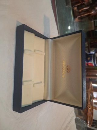 Caja de reloj Festina azul y dorada