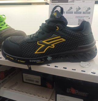 Zapatos de seguridad U-Power negros y amarillos.