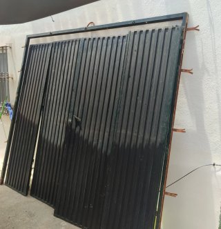 Puerta de hierro para almacén