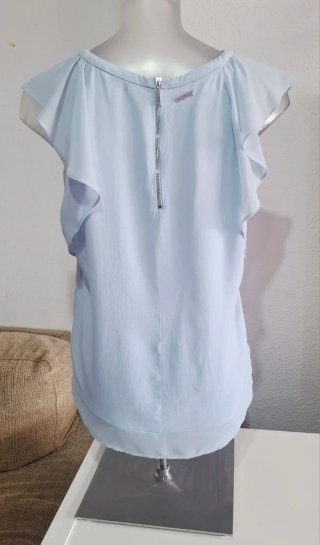 Blusa Tintoretto azul con volantes