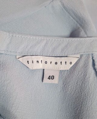 Blusa Tintoretto azul con volantes