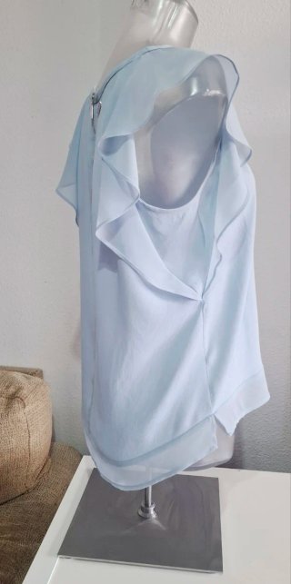 Blusa Tintoretto azul con volantes