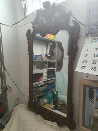 Espejo de madera tallada antiguo