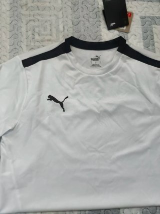 Conjunto deportivo Puma blanco y negro