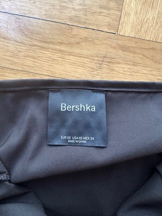 Vestido mini negro con brillos plateados