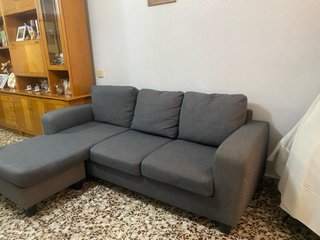Sofá modular gris en buen estado