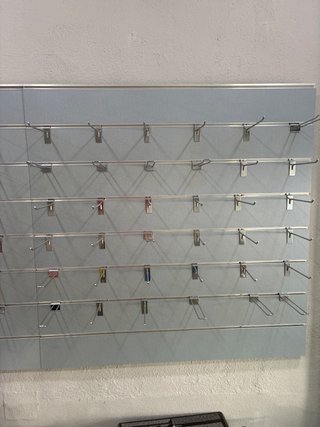 Tableros con ganchos para exposición