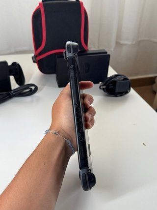 Nintendo Switch + Accesorios y Funda