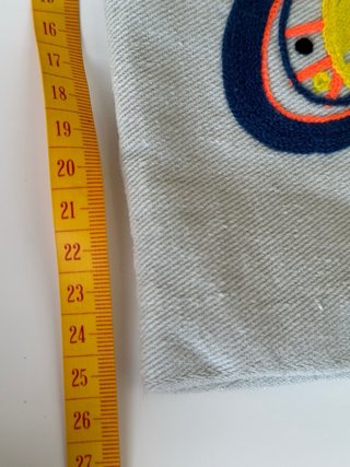 Pochette tela grigia farfalla ricamata