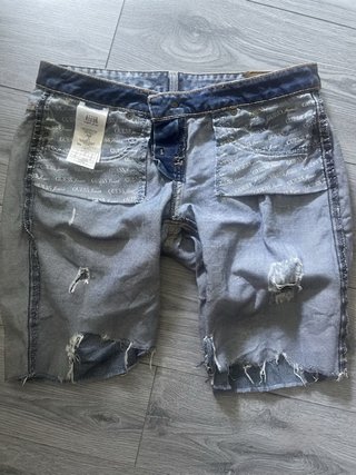 Pantalones cortos vaqueros Guess desgastados