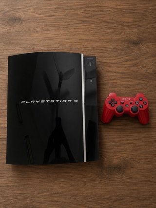 PlayStation 3 con mando y 11 juegos. No negociable