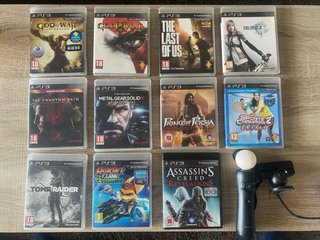 PlayStation 3 con mando y 11 juegos. No negociable