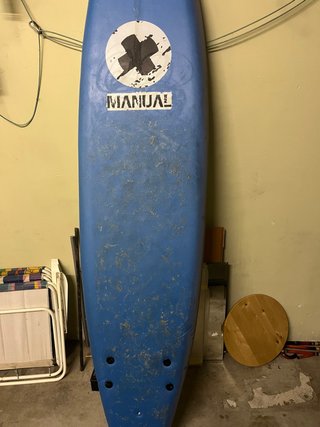 Tabla de surf azul para principiantes