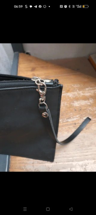 Pochette Alviero Rodriguez nera e argento