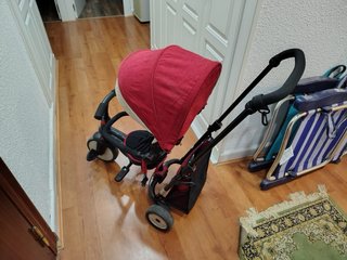 Triciclo para bebé con capota