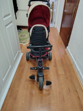 Triciclo para bebé con capota