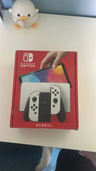 Nintendo Switch OLED Blanca con 4 juegos