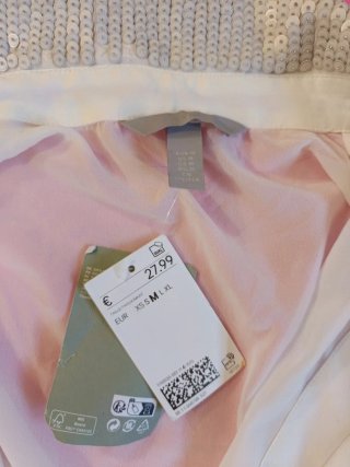 Blusa blanca con cuello plateado