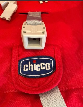Seggiolino auto e marsupio Chicco Auto-Fix