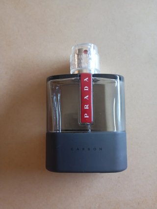 Conjunto Neceser Prada Ocean y frasco vacío Carbon